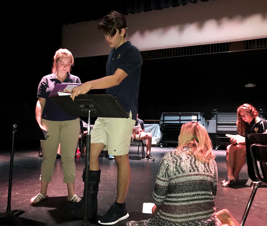 Students Chelsea Terry and Logan Mays rehearse for the fall show, guided by drama teacher Ms. Meyer.