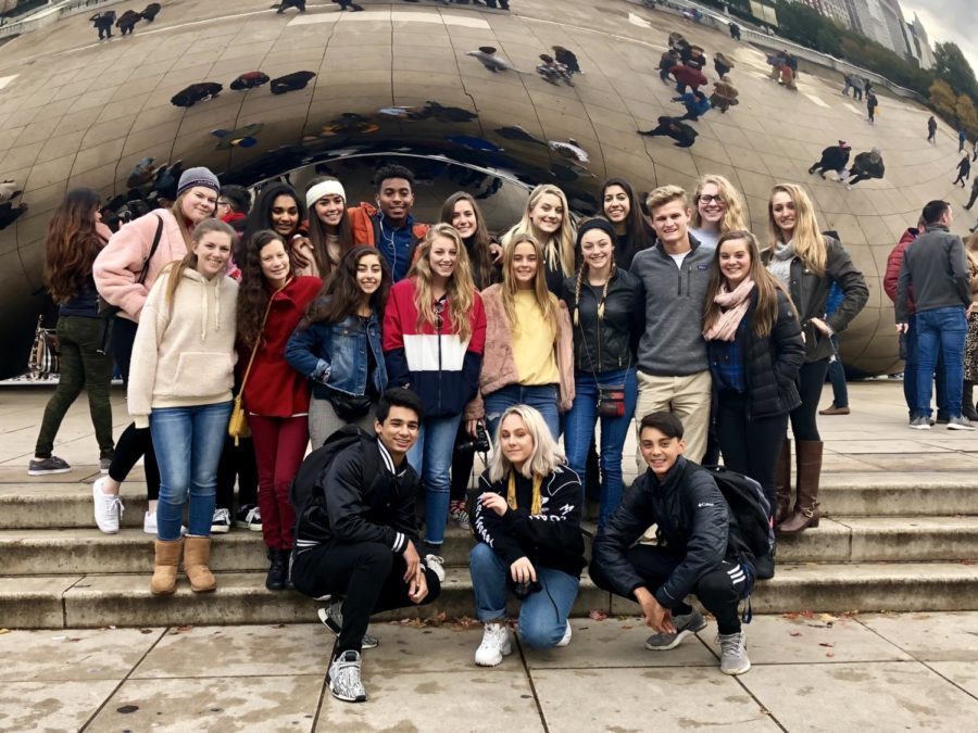 The+journalism+students+gathered+around+the+Bean.