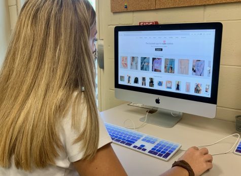 Senior Alex Davenport uses the app Curtsy to sell clothes online.