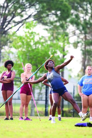Evelyn VanZwieten throws the discus and javelin at the Holy Trinity Invitational on March 4, 2023.VanZwieten competed in the javelin, shotput, and discus, winning all three events.