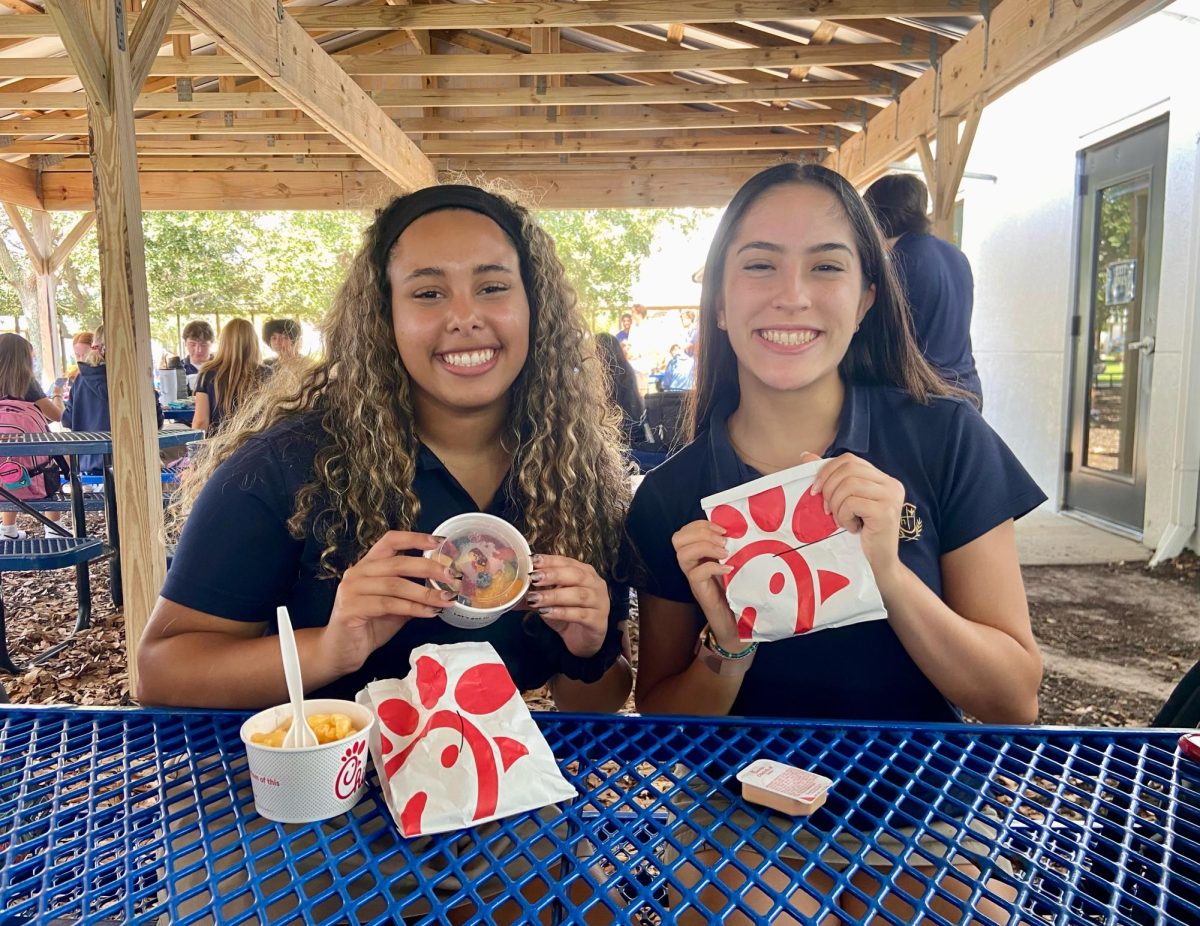 Left to right: Amalia Correa Lopez, Isabella Tichy. Sophomores Amalia Correa Lopez and Isabella Tichy are among the many students who enjoy their Chick-fil-A lunches on Tuesdays. 
