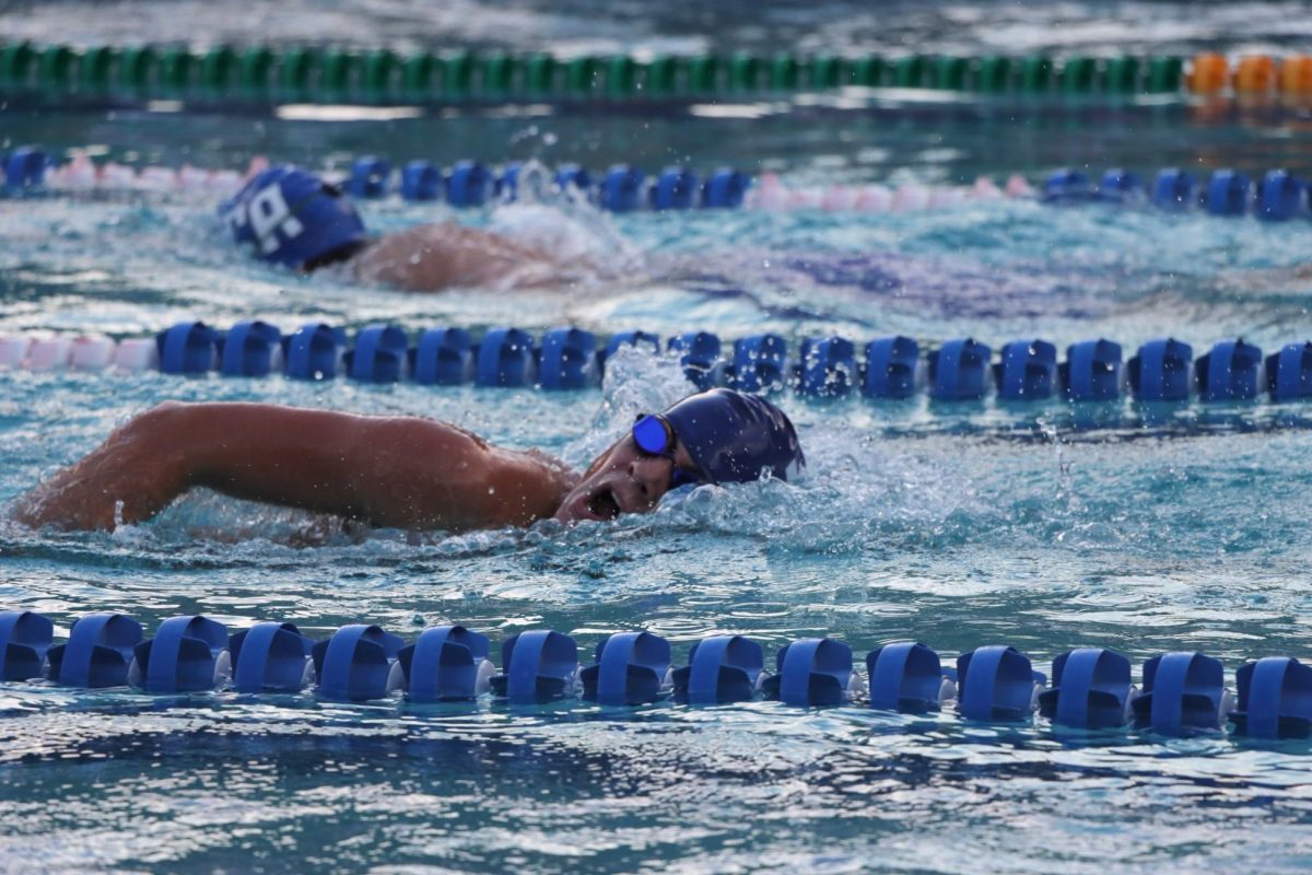 Freshman Landon Cangiano competes in the 500m Freestyle during the swim teams’ first meet against Cornerstone Charter Academy.