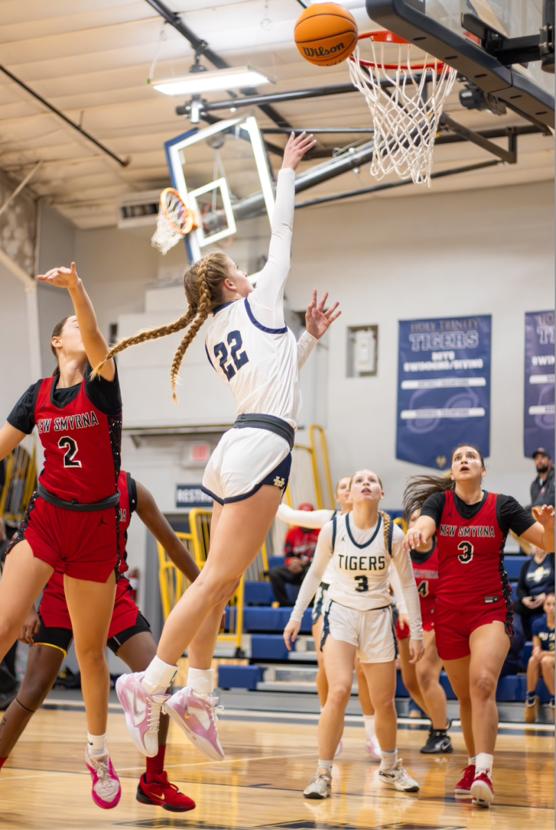 Sophomore Sammatha Fraser scores a point for her team in their game versus New Smyrna Beach.