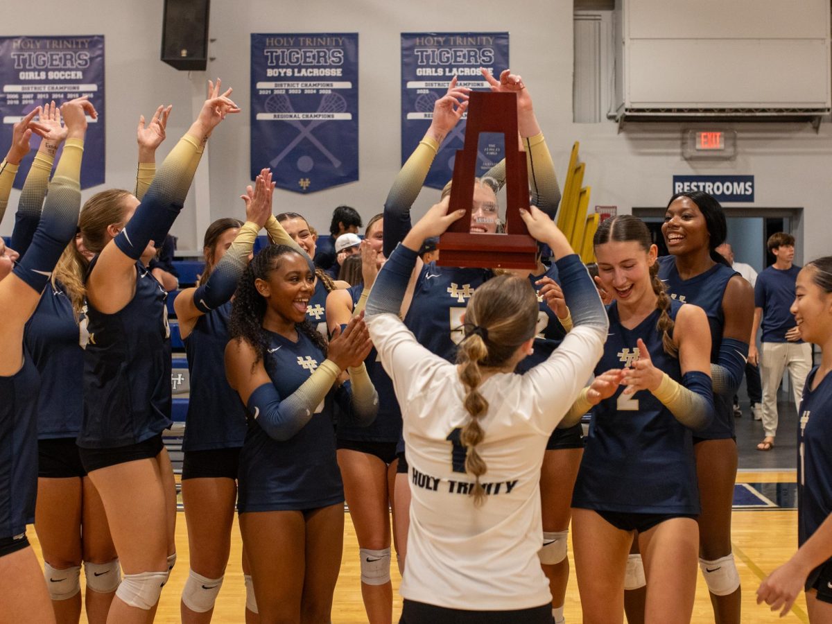 The girls varsity volleyball team won their fourth consecutive district champion title against the Edgewood Redwolves.