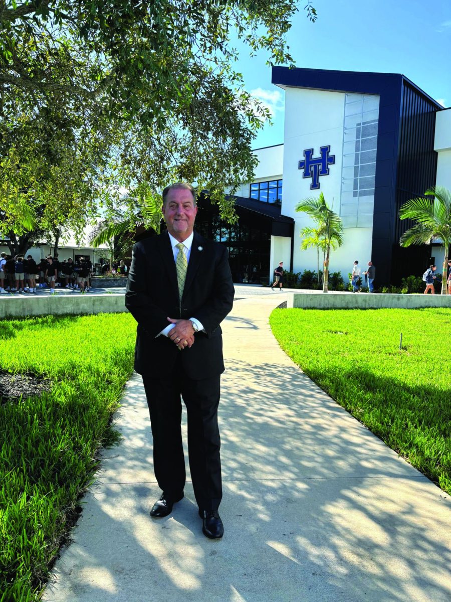 Kellam, recently appointed interim head of school, stands before the IDEAS Institute as he begins his leadership role for this year.