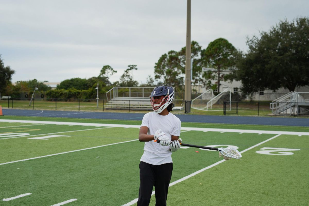 Myles Smith works on his stick skills after shooting at Kelly Stadium on December 9, 2025.